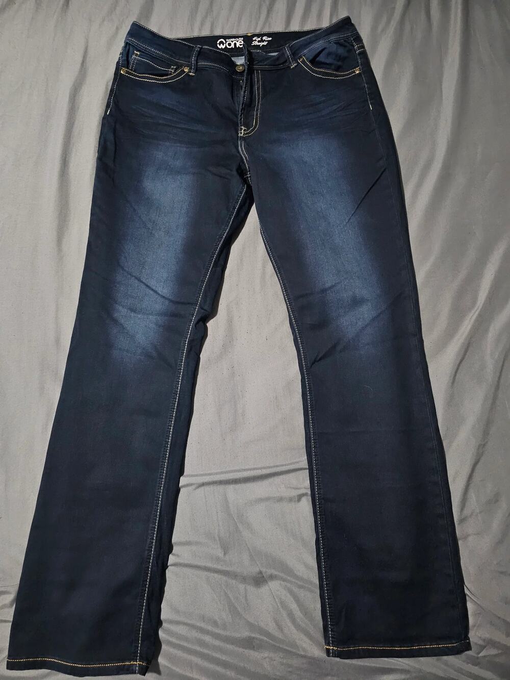Dark wash denim jeans with contrast stitching